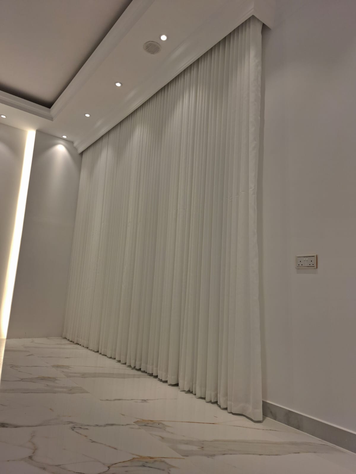 Custom home curtains in a Qatari villa living room